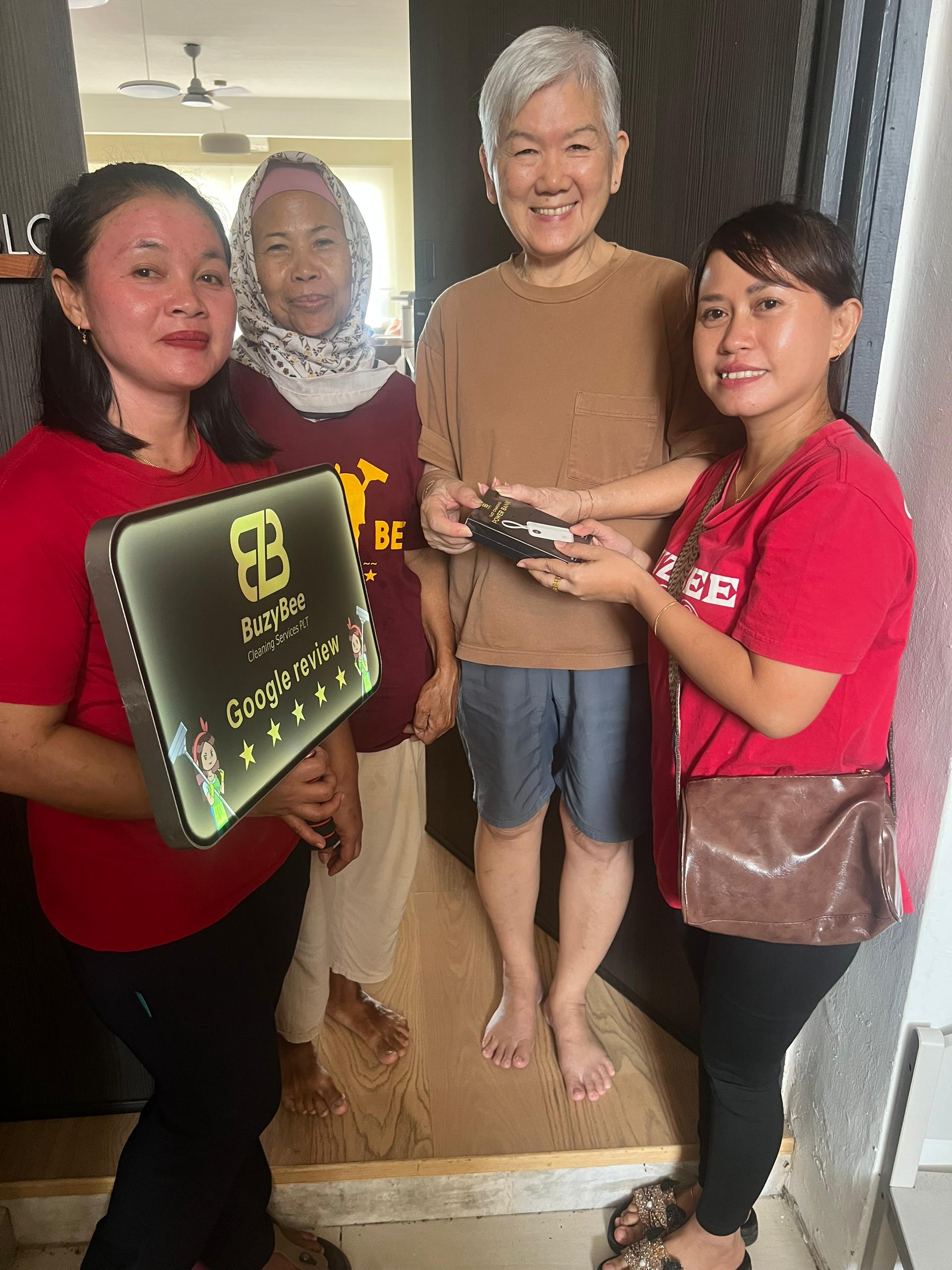 Female Customer in Brown Shirt Positive Review with BuzyBee Cleaning Services