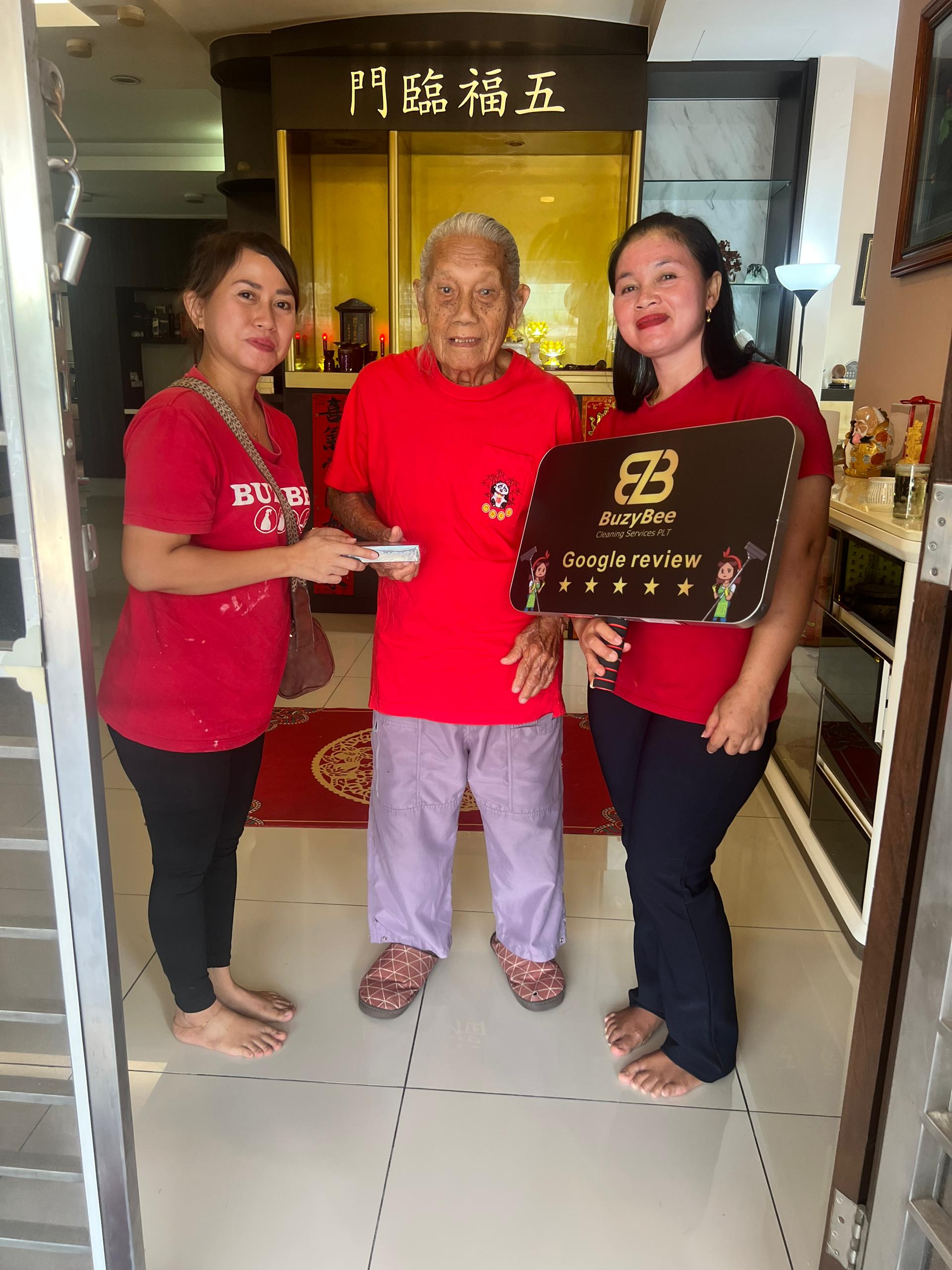 Elder Customer in Red Shirt Positive Review with BuzyBee Cleaning Services